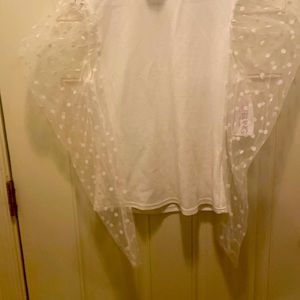 New, white shirt with polka dots sleeves sheer